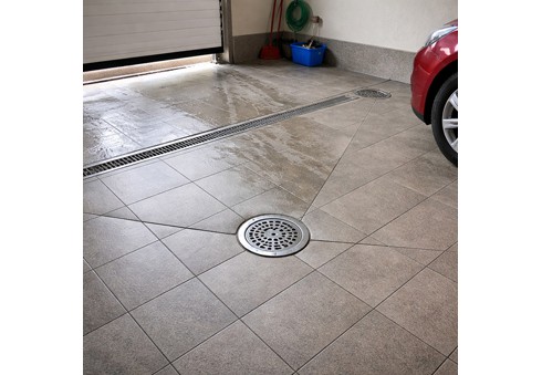 Garage Floor Slope – What Should It Be and Why Is It So Important?